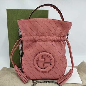 Gucci
GG Quilted Leather Mini Drawstring Bag
c. 2019
